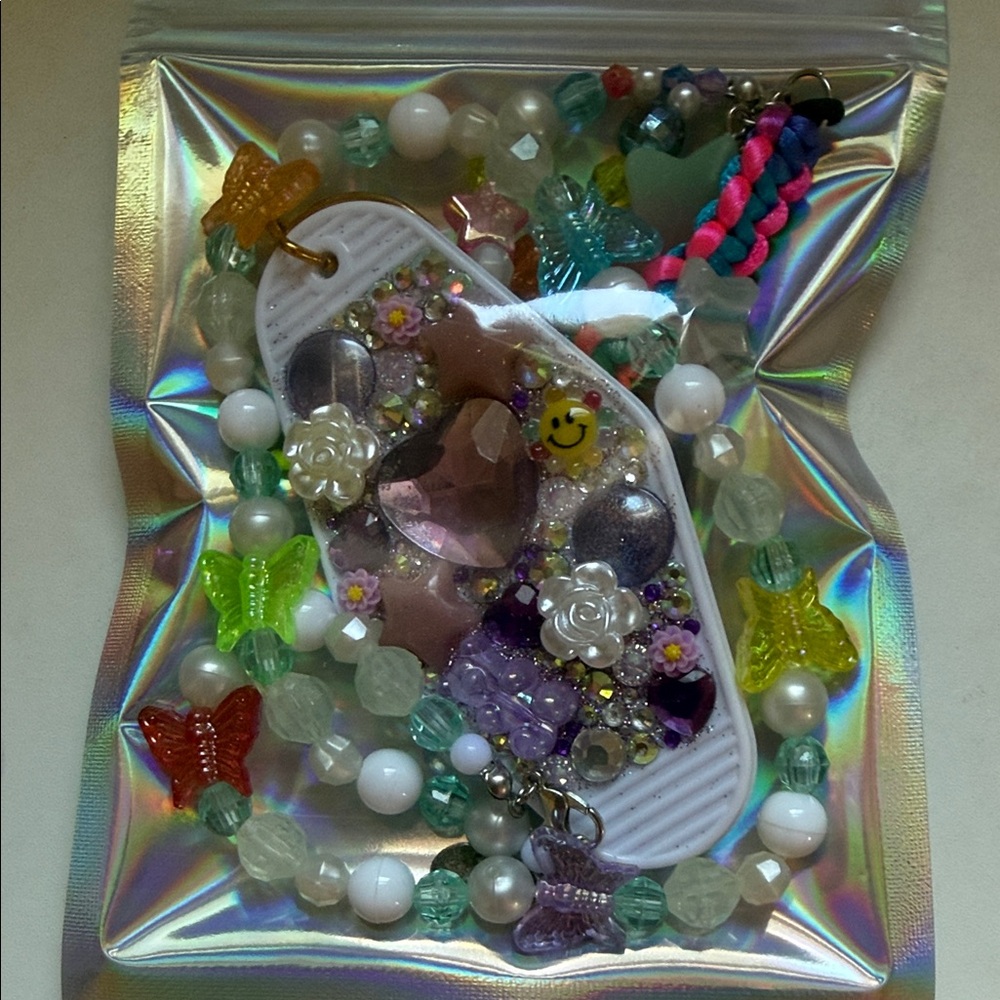 mystery pack - beaded necklace, beaded bag charm keychain, hotel keychain